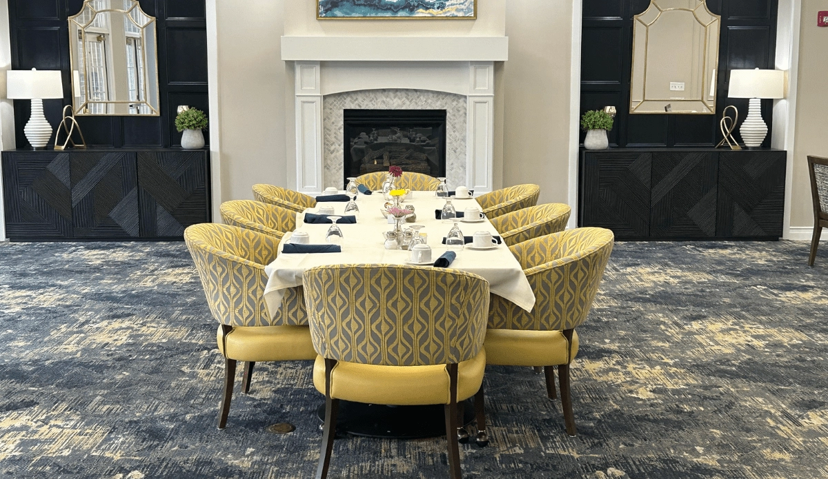 Dining area with long table and chairs