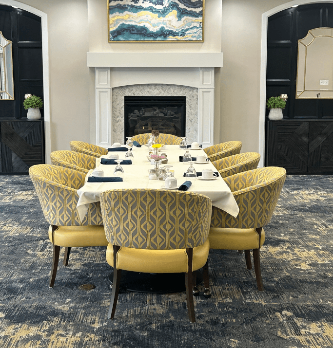 Dining area with long table and chairs