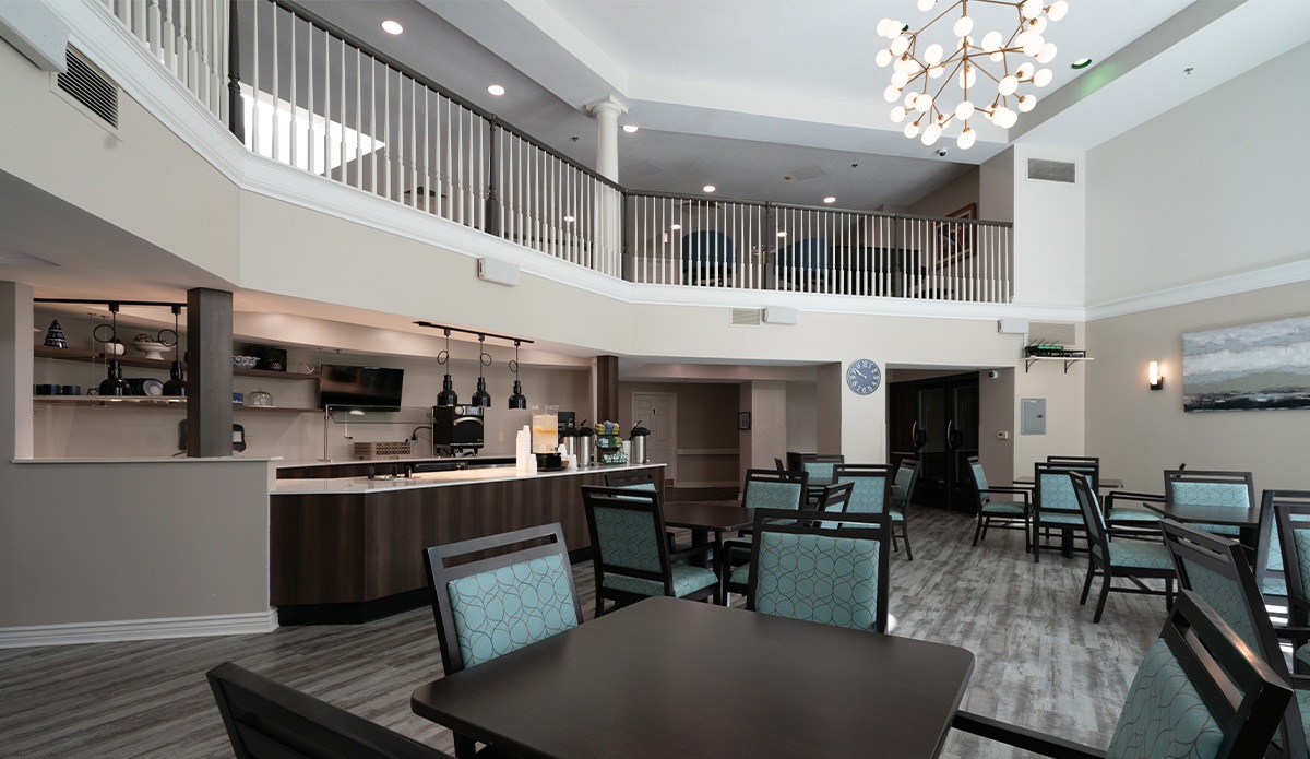 dining room in a senior living community, featuring tables set
